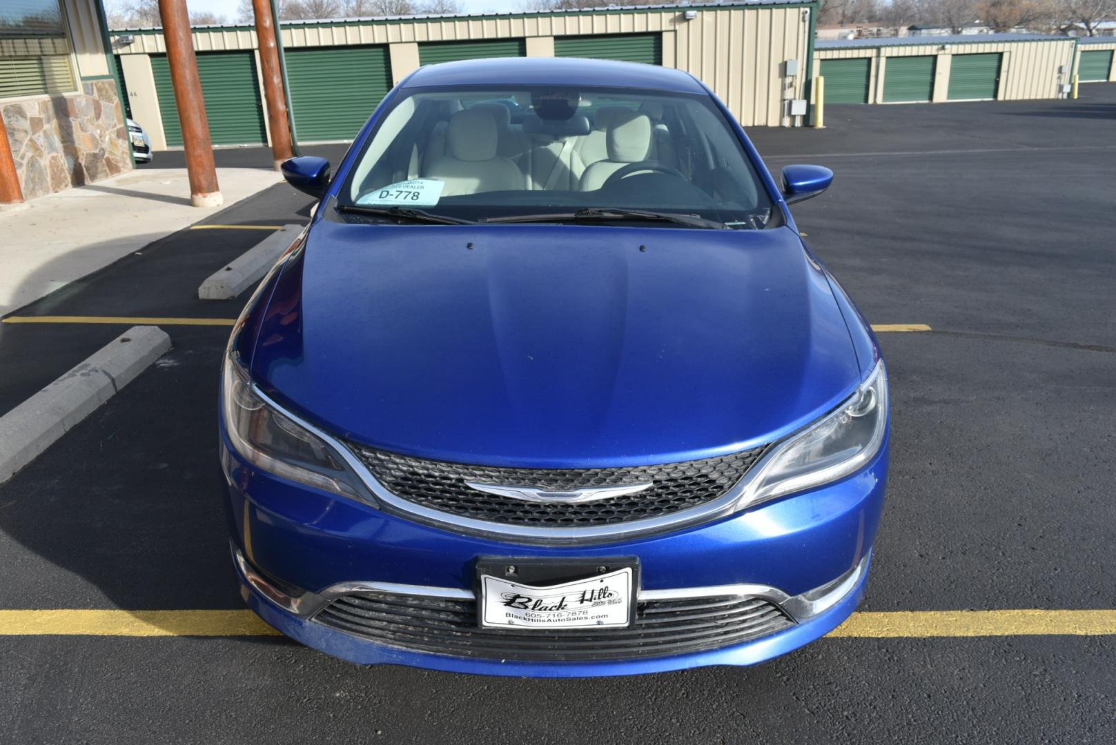 2016 Blue /Beige Chrysler 200 Limited (1C3CCCABXGN) with an 2.4L 4 Cyl Multiair engine, 9-Speed Automatic transmission, located at 1600 E Hwy 44, Rapid City, SD, 57703, (605) 716-7878, 44.070232, -103.171410 - Photo#1